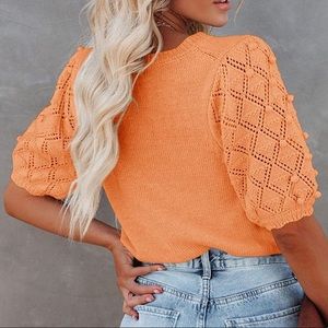 NEW without tags orange sweater shirt with lacy short sleeves